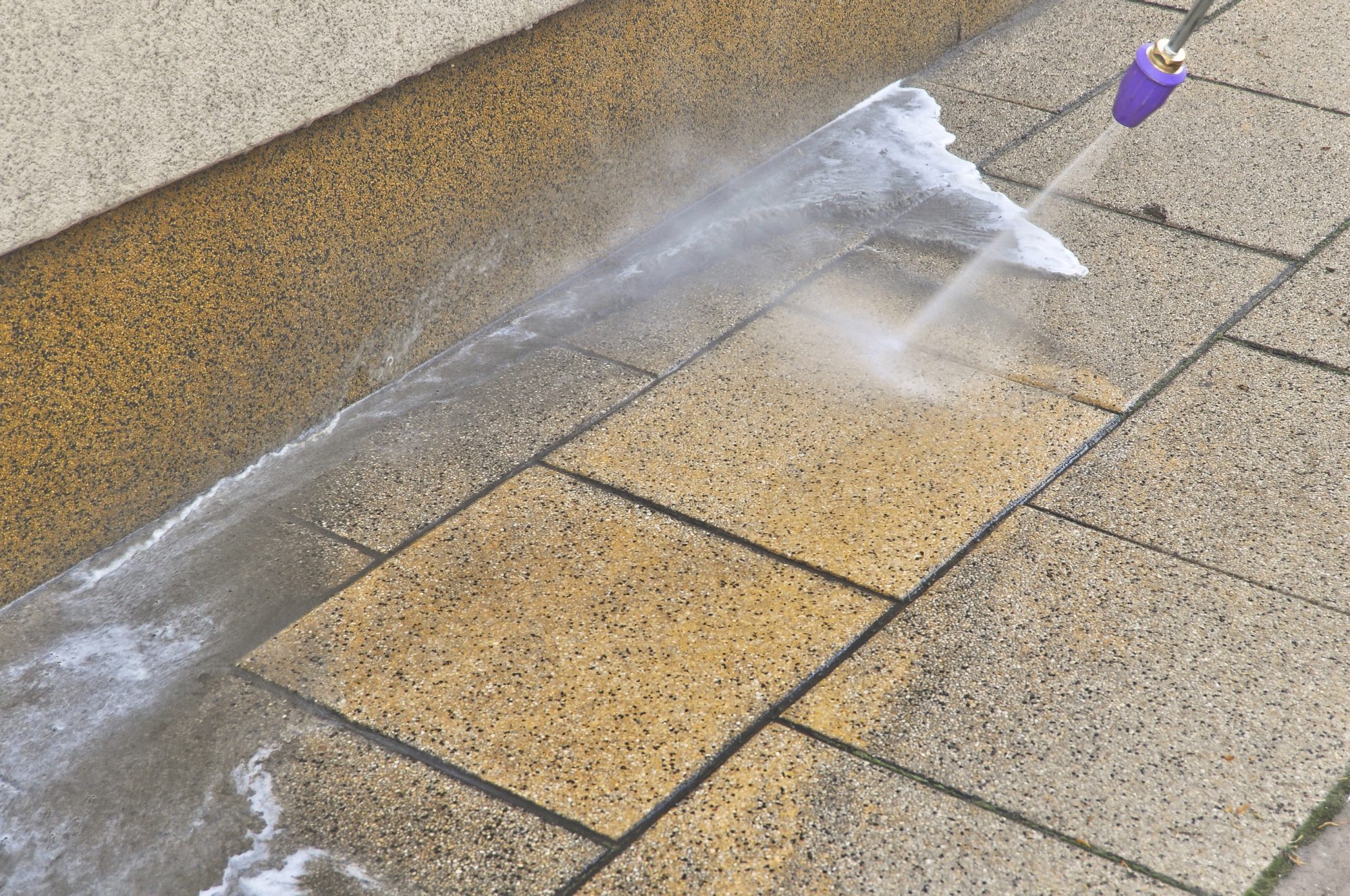 High pressure pavement cleaning